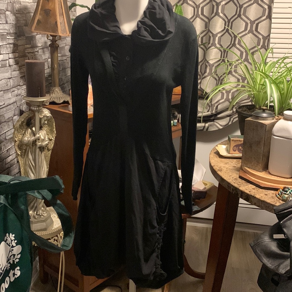 This one of a kind RARE sweater dress is a must have !!